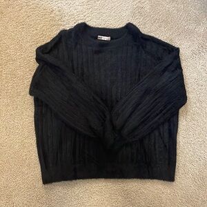 Black crewneck sweater